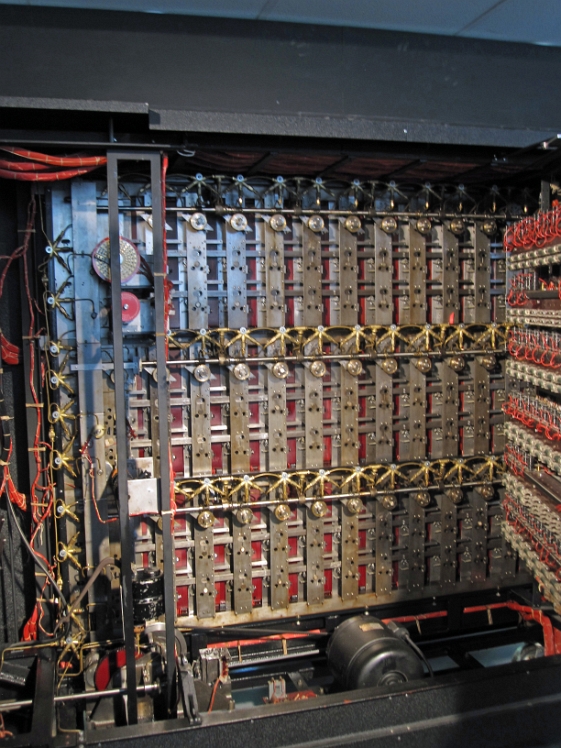 IMG_4986.JPG - Backside of the Bombe showing levers and relays (on the rotated chassis at the right).                               
