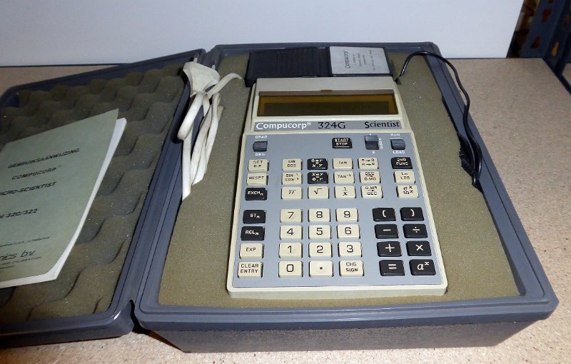 P1030475.JPG - The Compucorp 324G was one of the first scientific and programmable calculators (1971). Built in the USA.