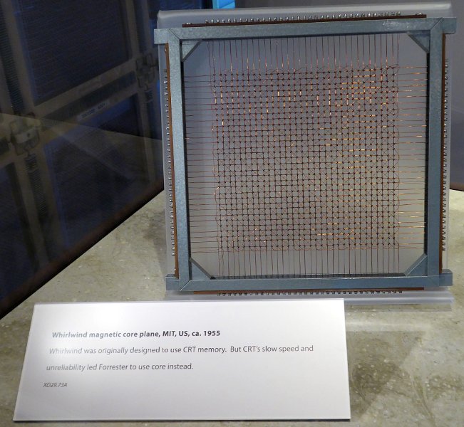 CHM042b.JPG - The "solid-state" core memory was a big step to more reiiable memories. An Wang (founder of Wang Computers) was one of the main pioneers of this technique. This board comes from the anti-aircraft Whirlwind system used by the US airforce during the cold war. .