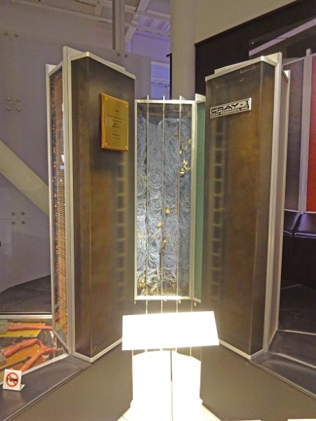CHM057.JPG - Seymour's Cray CRAY-1 computer, cooled by liquid Freon: fastest computer of it's time. Cabling partially still by electic wires, not printed circuit boards.