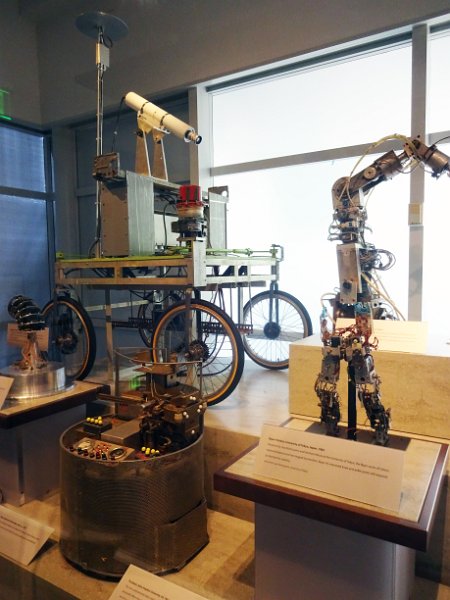 CHM069.JPG - Various prototype robots and/or robotic arms.