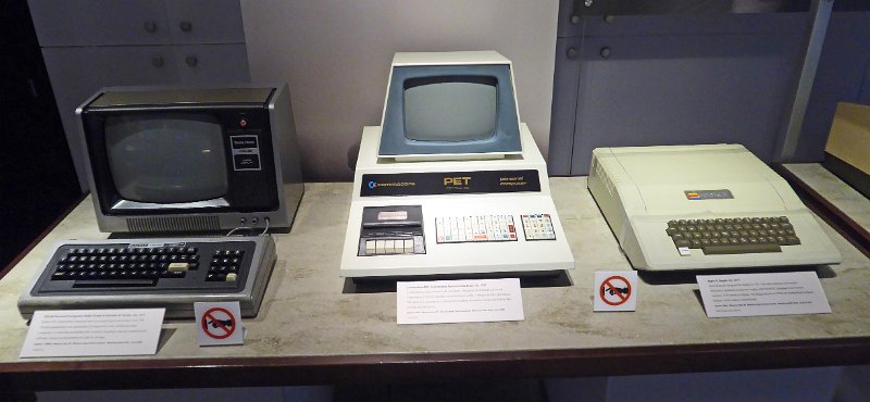 CHM103a.JPG - Three working systems also on display at the Computarium: Tandy TRS80, Commodore PET and Apple II.