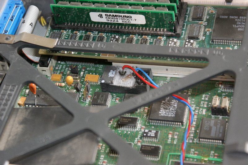 DSC01197.JPG - Wires glued to chip with epoxy.