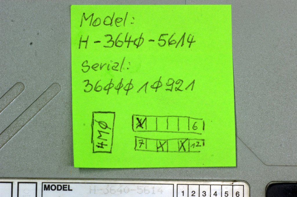 DSC07838.JPG - These are the model and serial numbers. The two row block of 12 cases has 1, 9 and 11 crossed.