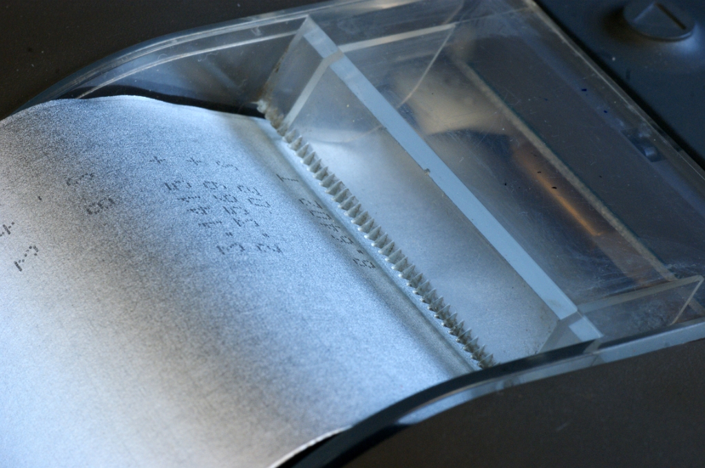DSC04497.JPG - Plexiglass cover with tear-off teeth.