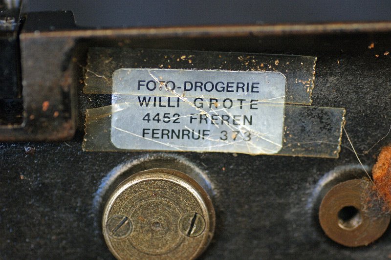 DSC02396.JPG - Sticker of (one of) the previous owner(s), a drugstore in Freren, Germany (Osnabrück region). The 3 digit  phone number ("Fernruf 373") is a hint to a pre-WWII age.