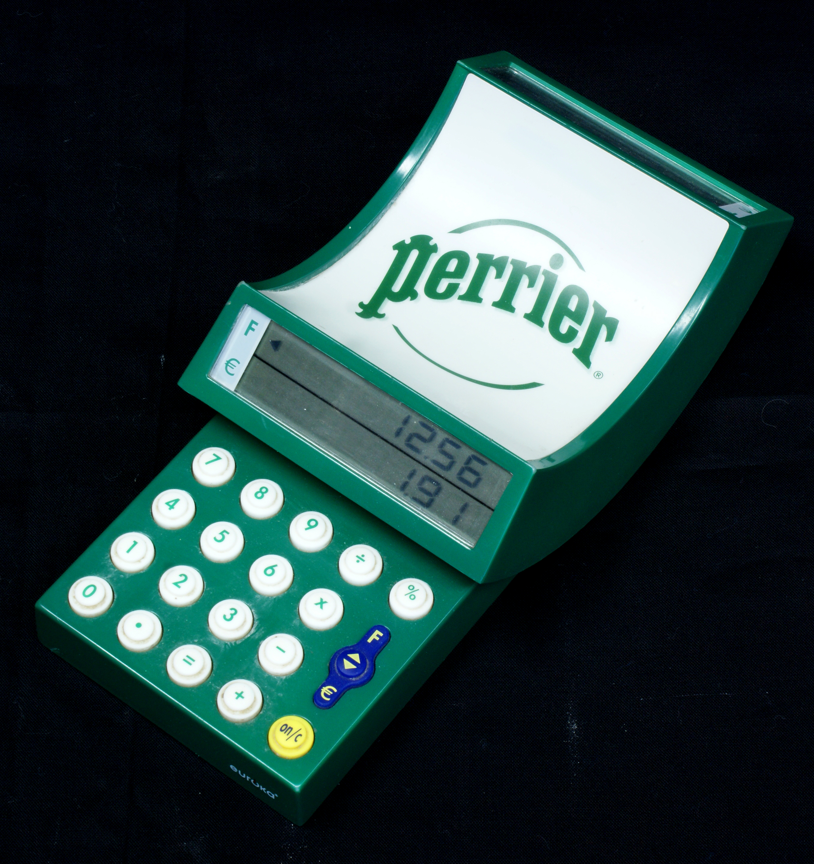 DSC07239.JPG - The item in the Computarium collection (donated by C. Heirendt) promotes the famous table water company Perrier. This item was in good shape, but the inside of the LCD screen covers needed some cleaning.
