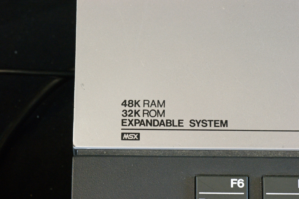 DSC03122.JPG - This is a 48 kB Ram model. The MSX standard (developed by Microsoft Japan) was meant to be an unified architecture for home computers. It was popular only in Asia and Europe, but less so in the US. All MSX computers had the same cartridge sockets and could run in principle all MSX labeled cartridges. MSX = MicroSoft eXtended.